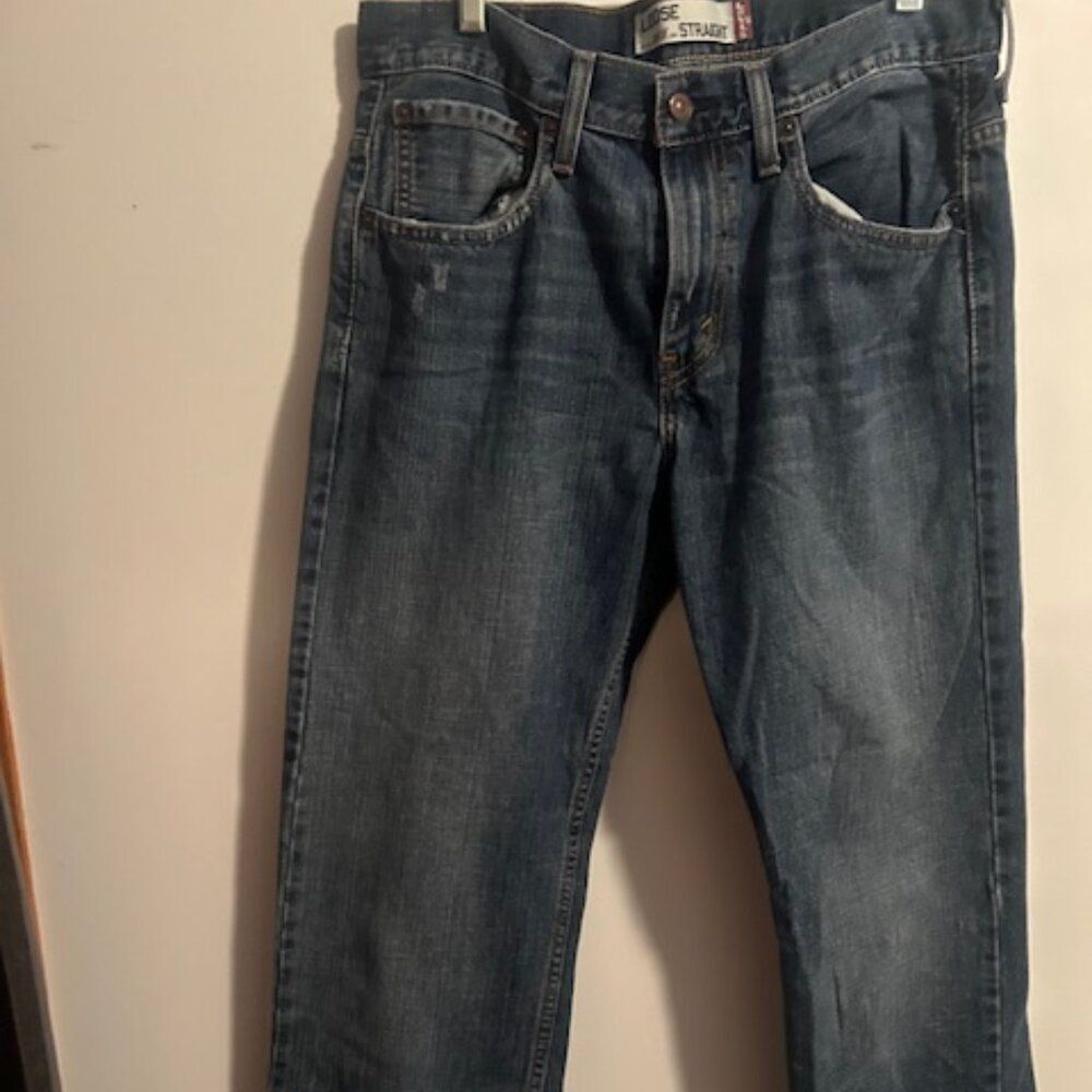 Levi's 569 5 pocket Lose straight distressed denim jeans, size 31/32